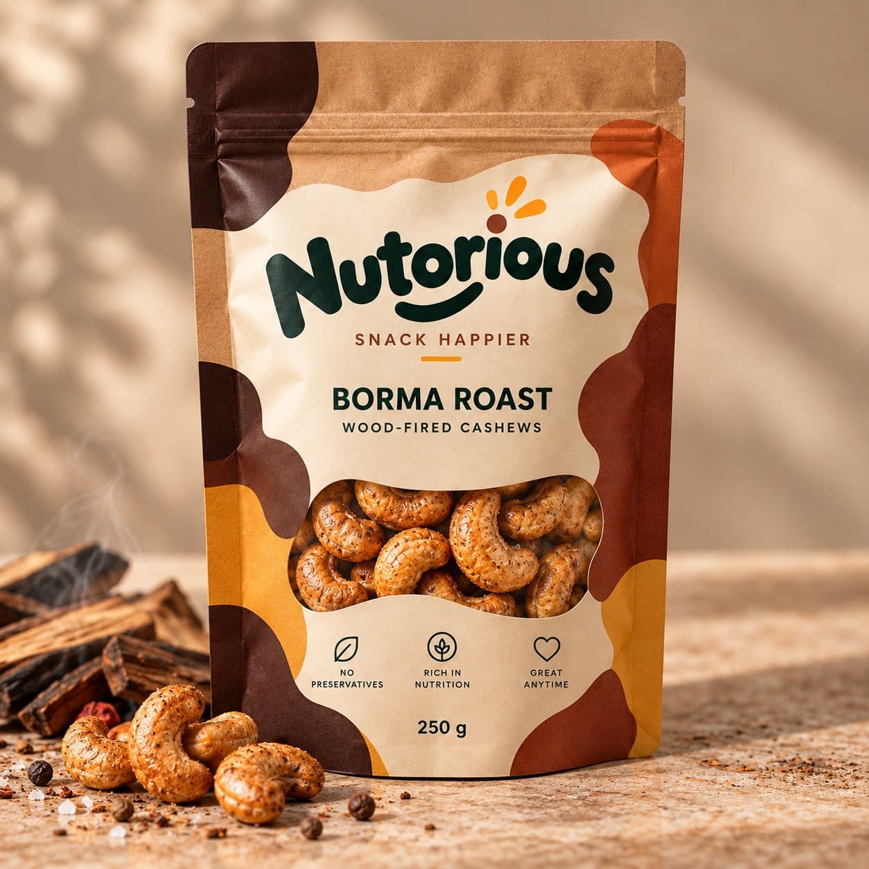 Nutorious Borma Roast wood-fired cashews 250 g pouch beside charred wood